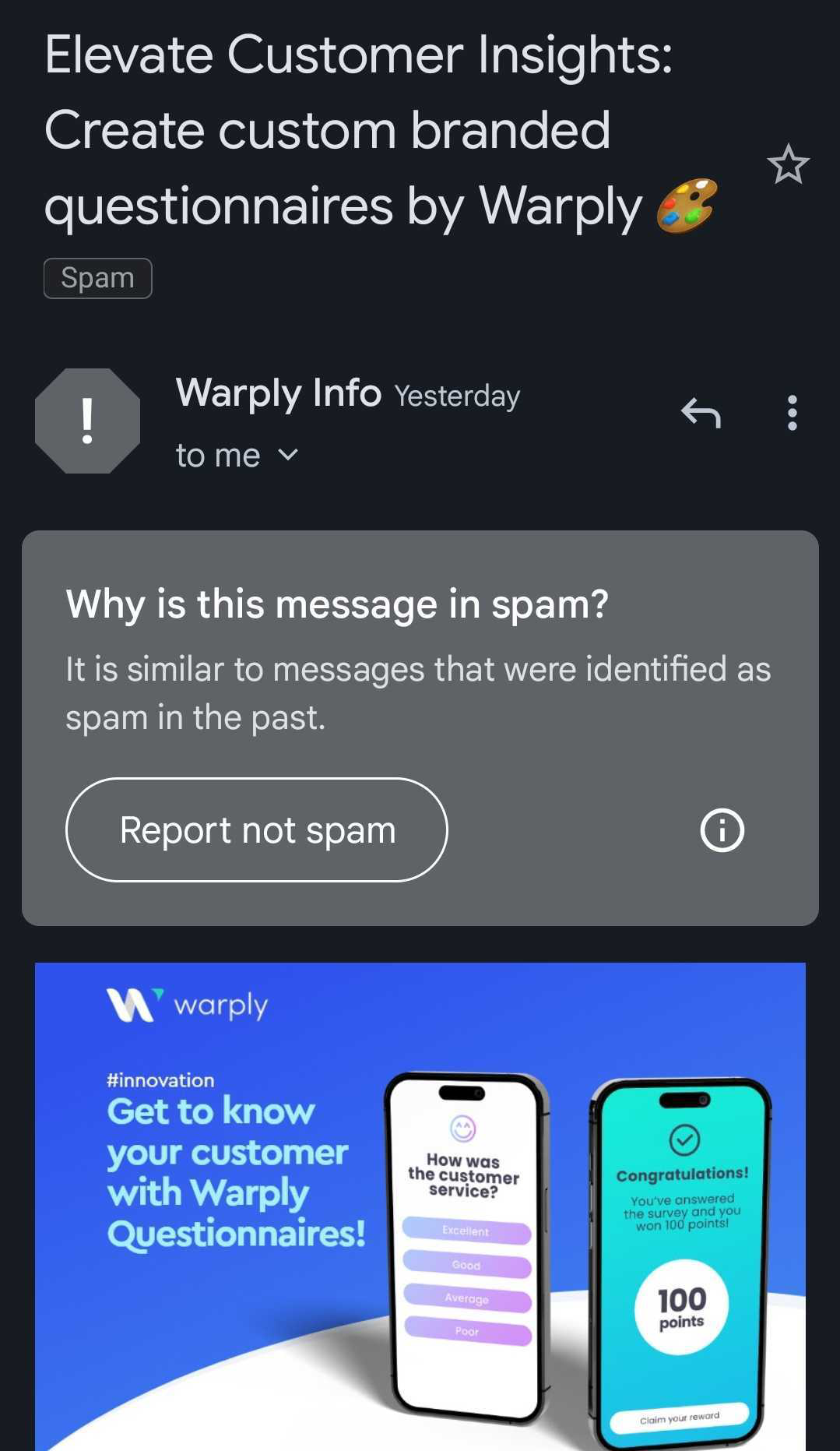 An image showing an email found in the spam folder and how to report it as not spam